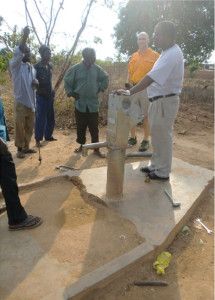 Partner John Spesia visits the Joliet Rotary well in Malawi Africa in November 2013. The Spesias helped provide clean water and other lifechanging amenities for those with no hope.